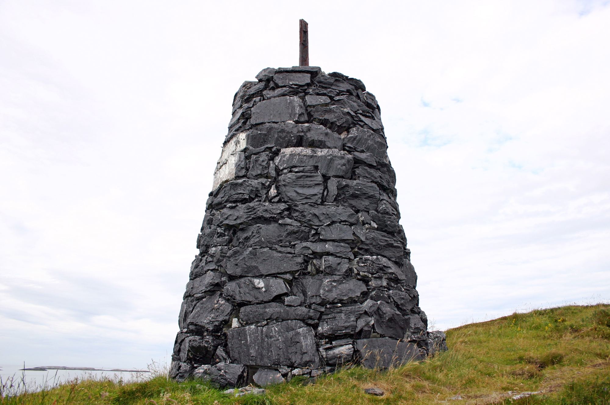 A stone cairn, or varde, standing on open Norwegian upland